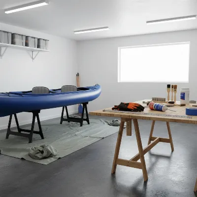 Preparing the work area for inflatable kayak skeg installation with tools laid out